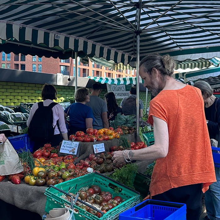 People browsing at market stalls