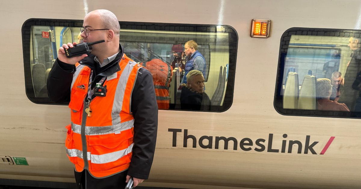 Thameslink train with staff member
