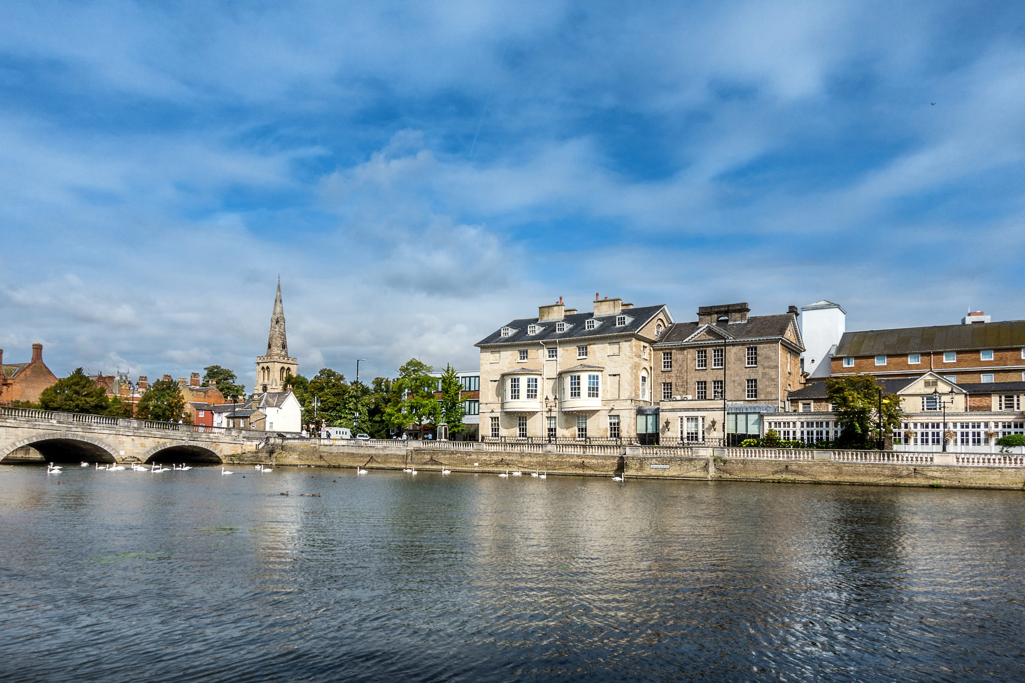 a castle surrounded by a body of water