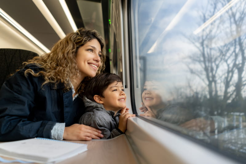 a person sitting in front of a window