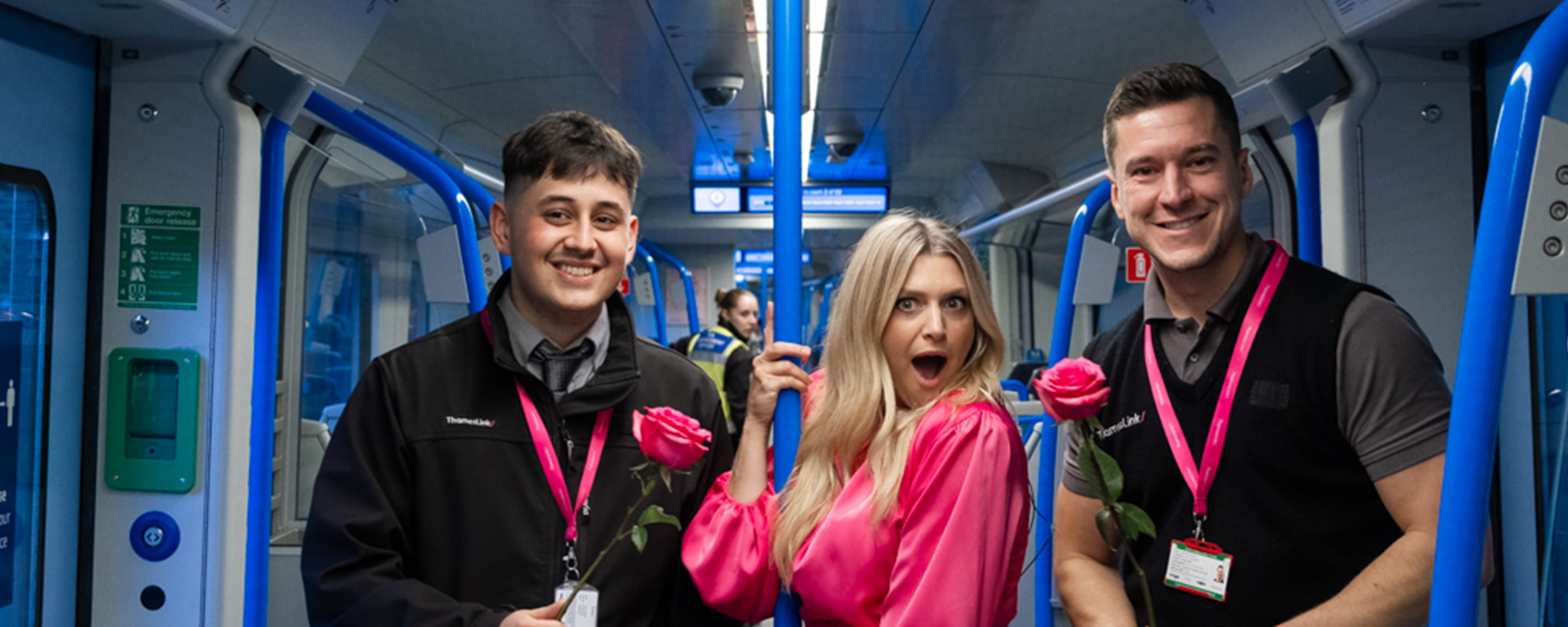 Three people in a train carriage