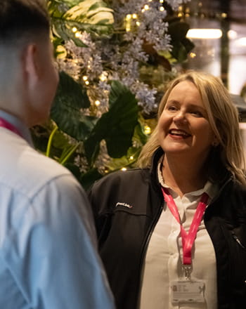 A woman smiling at a man