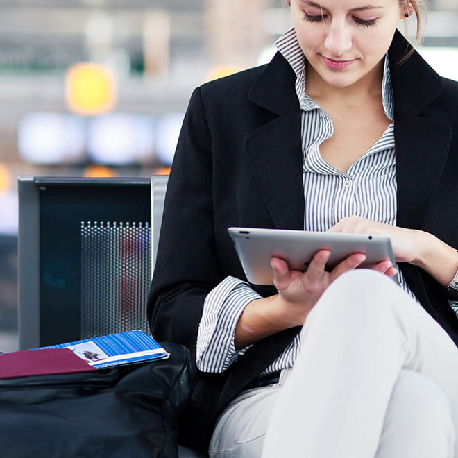 a woman holding a cell phone