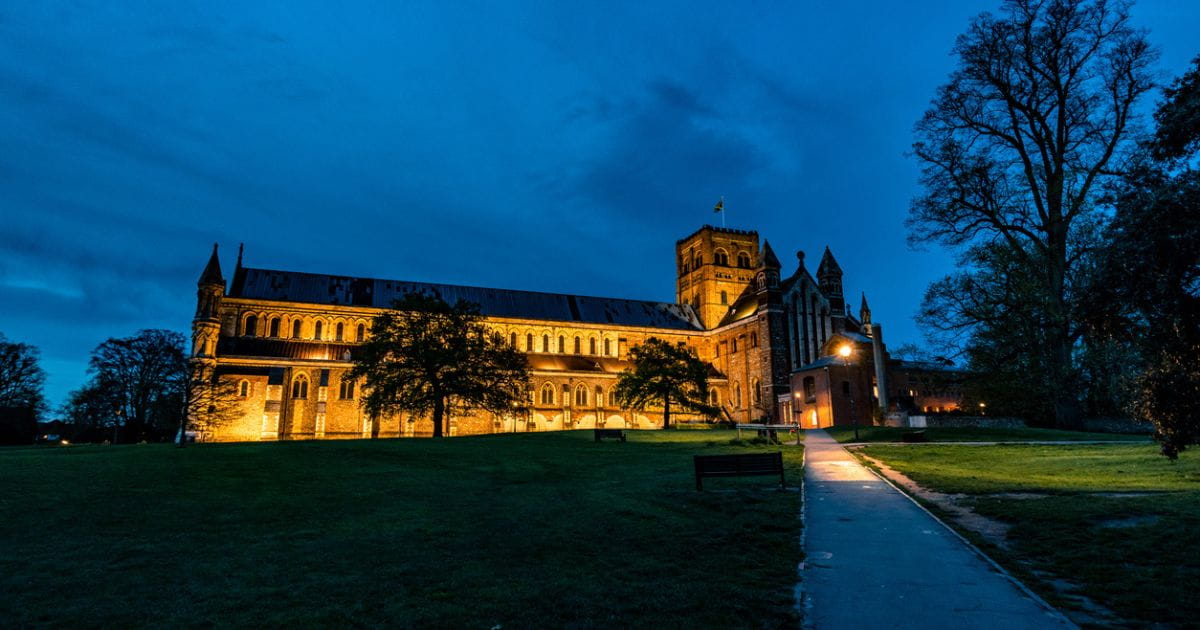 St Albans cathedral lit up at dusk