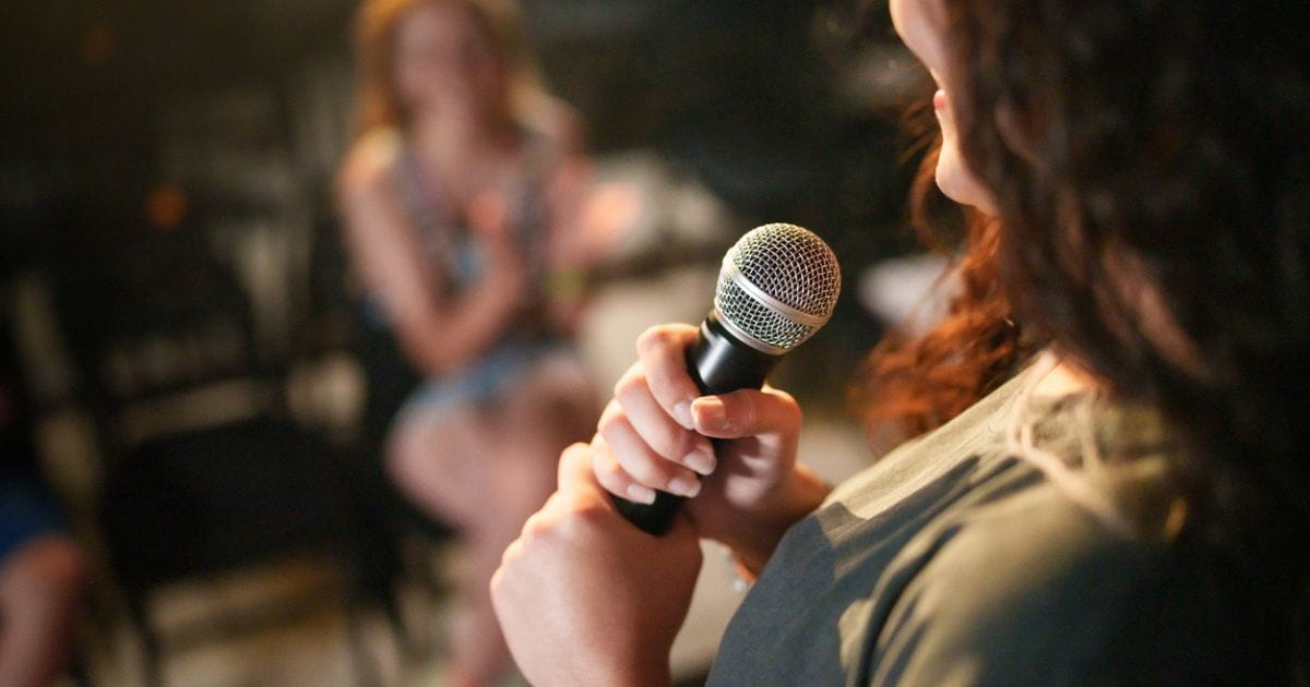 Stock image of a person doing comedy