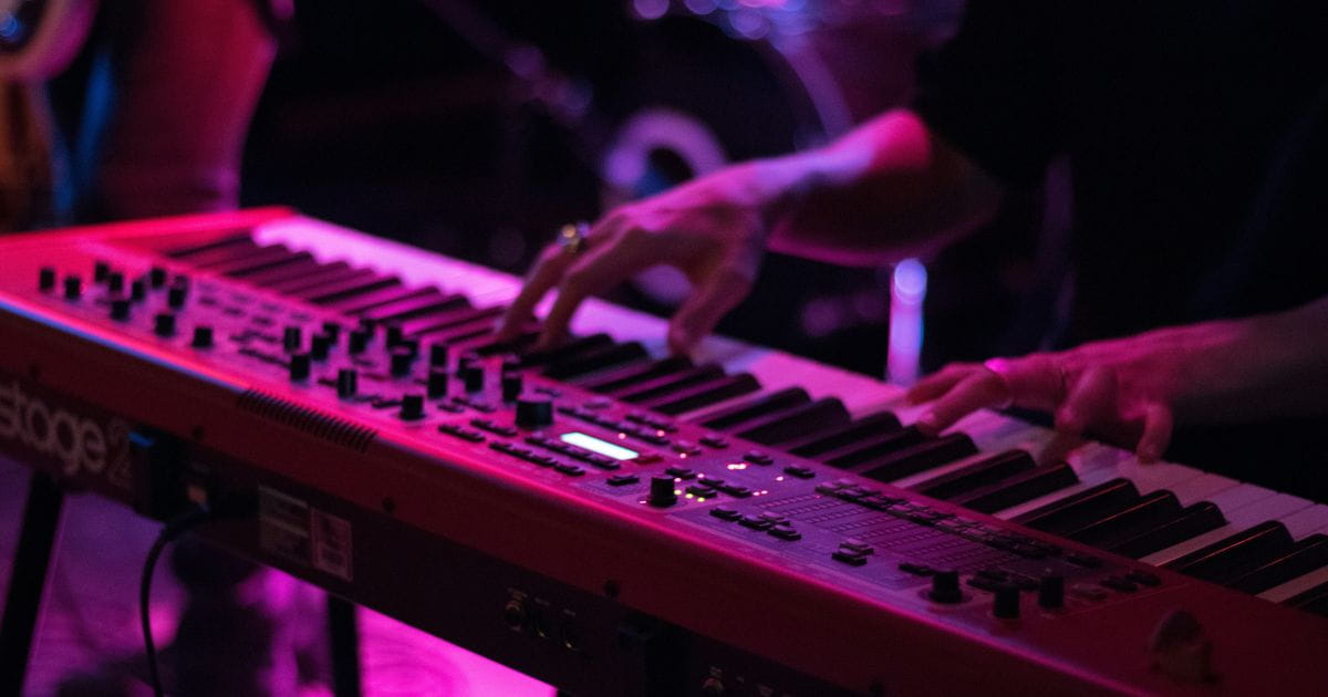 Stock image of a person playing piano