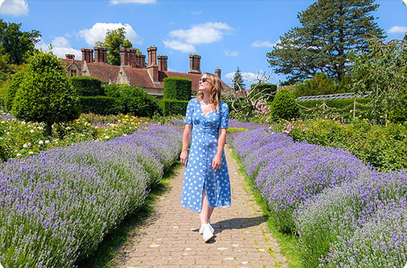 A girl walking in gardens