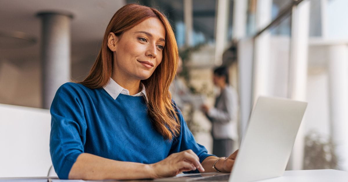 A woman using a laptop