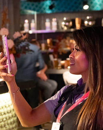 A woman looking at her phone