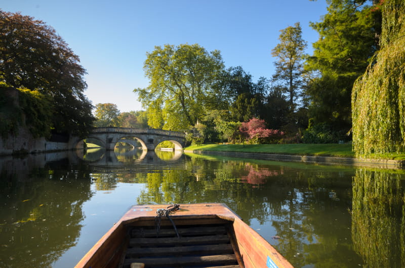 a wooden boat in a body of water